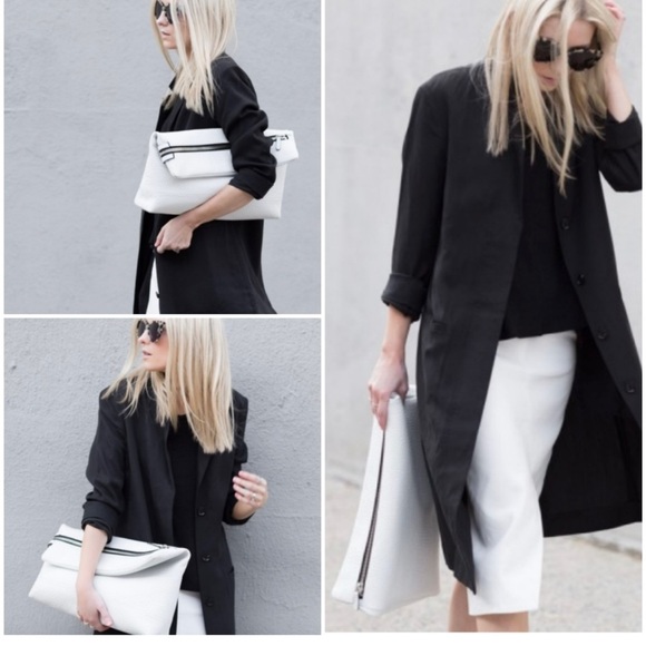 Aritzia Handbags - Aritzia Six Eleven Large Leather White Huggable Clutch